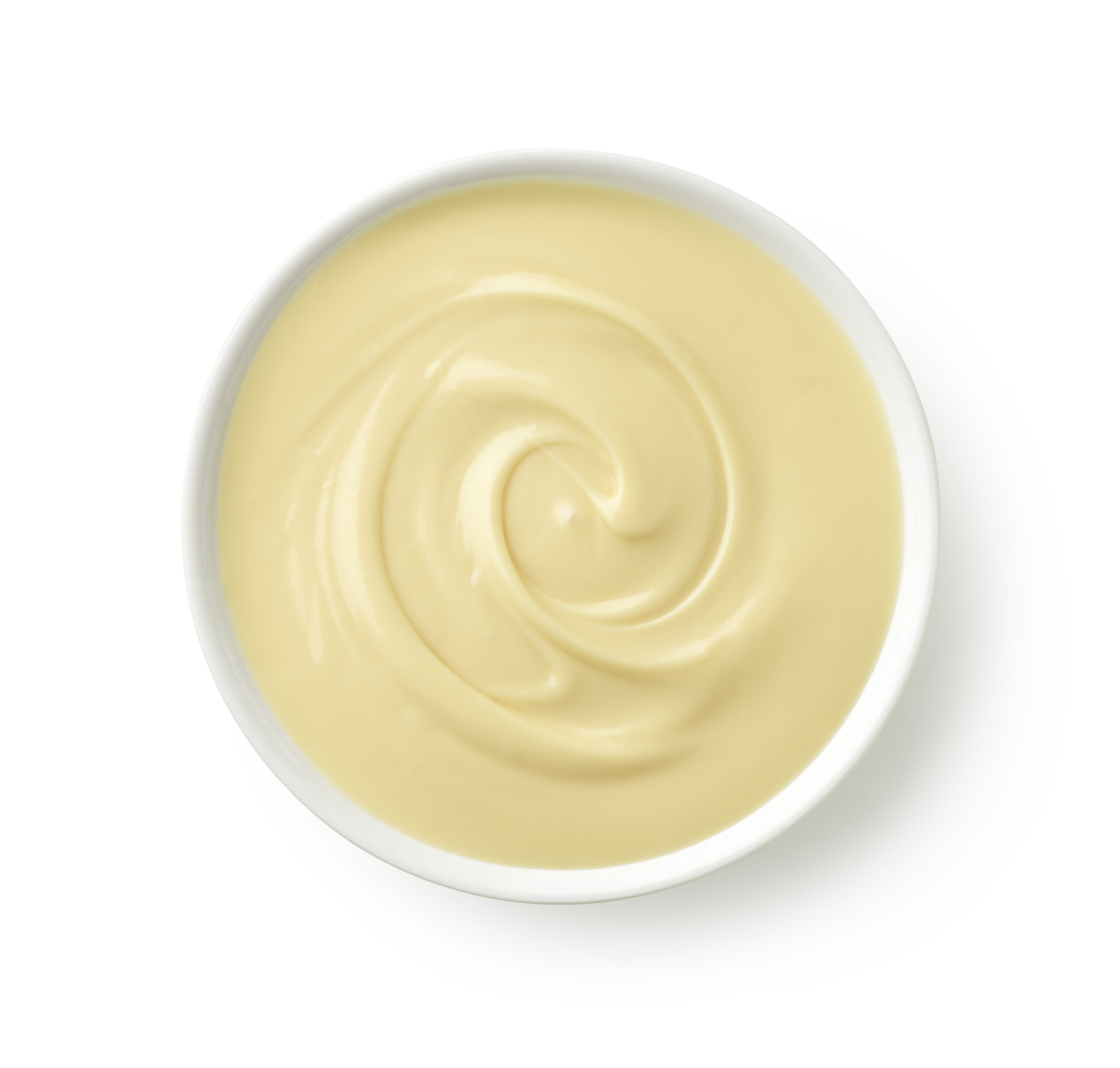 Bowl of melted white chocolate isolated on white background Наповнювач молоковмісний з ароматом"Заварний крем"